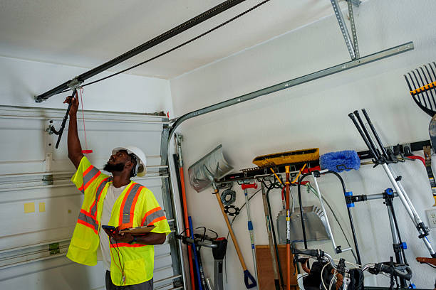 Professional Garage Door Panel Replacement technician working in Logan County County, OK